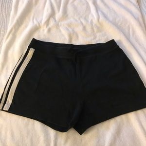 Black shorts with a white racing stripe...